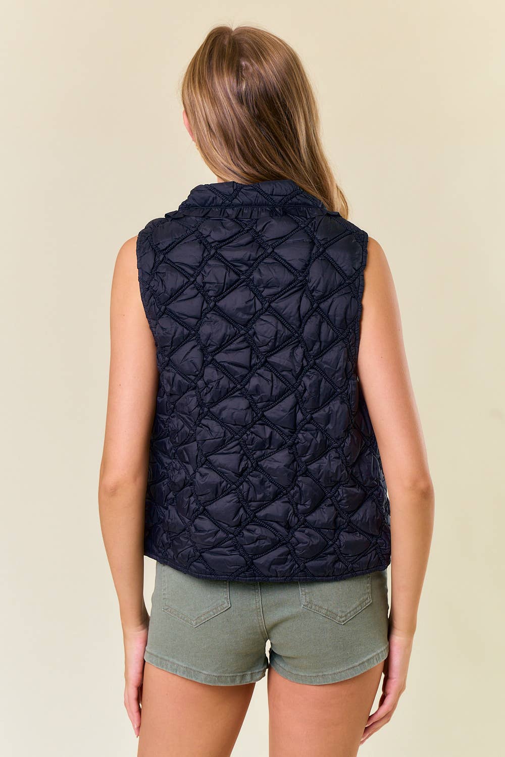 Ruffled and Quilted Vest
