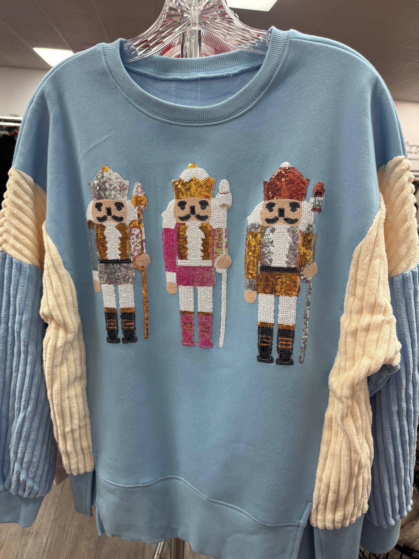 Blingy Blue Nutcracker Pullover Top
